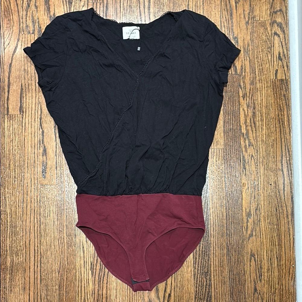 Gorgeous Sezane Black Bodysuit. Minimalist. Chic. Parisian.